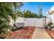 Enchanting outdoor patio with brick pavers, comfortable seating, and lush greenery at 4127 53Rd S Ave, St Petersburg, FL 33711