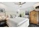 Cozy bedroom features a comfortable bed, soft lighting, and elegant decor at 441 Village Dr, Tarpon Springs, FL 34689