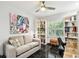 Bright office featuring custom shelving, black marble floors, and stylish decor at 441 Village Dr, Tarpon Springs, FL 34689