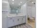 Clean and modern bathroom with white cabinets, vanity, and toilet at 5020 Mill Pond Rd # 3158 & 3160, Wesley Chapel, FL 33543