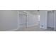 Spacious room with wood floors leading to a bathroom and closet at 5020 Mill Pond Rd # 3158 & 3160, Wesley Chapel, FL 33543