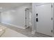 Hallway featuring hardwood floors, recessed lighting, and access to multiple rooms at 5020 Mill Pond Rd # 3158 & 3160, Wesley Chapel, FL 33543