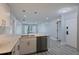 Open concept living space featuring updated kitchen, modern flooring, and plenty of natural light at 5020 Mill Pond Rd # 3158 & 3160, Wesley Chapel, FL 33543