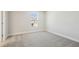 Cozy bedroom with neutral walls and carpet at 5335 Wolf Creek Dr, Apollo Beach, FL 33572
