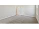 Empty bedroom featuring neutral walls and carpeted flooring at 5335 Wolf Creek Dr, Apollo Beach, FL 33572