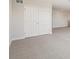 Empty bedroom with neutral walls and floors with double closet at 5335 Wolf Creek Dr, Apollo Beach, FL 33572