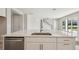 Close up view of the kitchen island with stainless steel sink and faucet at 5335 Wolf Creek Dr, Apollo Beach, FL 33572