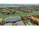 Aerial view of the waterfront community with private docks, and access to the Gulf of America at 545 Pinellas Bayway S # 109, St Petersburg, FL 33715