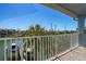 Balcony view overlooking the canal with boat docks and lush greenery at 545 Pinellas Bayway S # 109, St Petersburg, FL 33715