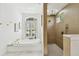 Bright primary bathroom with soaking tub and luxurious walk-in shower at 6314 Soratrace St, Lithia, FL 33547