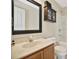This bathroom features tile floors, tile walls, and classic fixtures at 6843 Se Dartmouth Hill St, Riverview, FL 33578