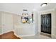 Bright, open kitchen with dark cabinets and stainless steel appliances at 6843 Se Dartmouth Hill St, Riverview, FL 33578
