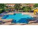 Community pool and amenity with nearby lounging and water view at 6843 Se Dartmouth Hill St, Riverview, FL 33578