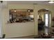 View of the kitchen featuring ample counter space and modern appliances, connecting to the dining area at 716 Burlwood St, Brandon, FL 33511