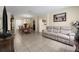 Spacious living room and dining area featuring tile floors and ample natural light at 716 Burlwood St, Brandon, FL 33511