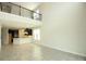 Open-concept living space with modern kitchen and large windows, perfect for entertaining at 740 Steel Dr, Apollo Beach, FL 33572