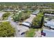 Birds eye view of the community with carport parking and lush green spaces at 8130 Braddock Cir # 3, Port Richey, FL 34668