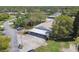 Birds eye view of the community with carport parking and lush green spaces at 8130 Braddock Cir # 3, Port Richey, FL 34668