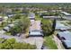 Wide aerial view of community homes, showcasing the well-maintained landscaping and carport parking at 8130 Braddock Cir # 3, Port Richey, FL 34668