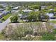 Overhead view showcasing the neighborhood's green spaces and well-kept homes at 8130 Braddock Cir # 3, Port Richey, FL 34668