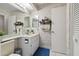 Bathroom with vanity, sink, toilet and decorative towels at 8130 Braddock Cir # 3, Port Richey, FL 34668