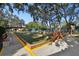Professionally maintained bocce ball court surrounded by benches, perfect for recreational activities at 8130 Braddock Cir # 3, Port Richey, FL 34668