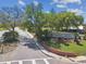 Timber Oaks community entrance sign surrounded by manicured landscaping at 8130 Braddock Cir # 3, Port Richey, FL 34668