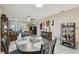 Open-concept dining and living area with plenty of space for entertaining guests and Gathering at 8130 Braddock Cir # 3, Port Richey, FL 34668