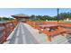 Community wooden dock featuring a picnic table and gazebo with a lovely view of the lake at 8130 Braddock Cir # 3, Port Richey, FL 34668