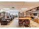 Comfortable library with bookshelves, tables, chairs, and good lighting at 8130 Braddock Cir # 3, Port Richey, FL 34668