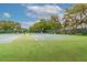 A well-maintained tennis court ready for a friendly match at 8130 Braddock Cir # 3, Port Richey, FL 34668