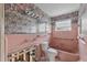 Bathroom with vintage pink tile, ready for a remodel at 9101 Oak Ne St, St Petersburg, FL 33702