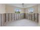 Bright bedroom with natural light, featuring tile floors and exposed walls ready for a remodel at 9101 Oak Ne St, St Petersburg, FL 33702
