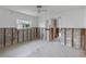 Bedroom featuring tile floors and exposed walls ready for a remodel at 9101 Oak Ne St, St Petersburg, FL 33702