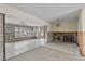 Open living room with tile flooring, canal views, and visible interior wall structure at 9101 Oak Ne St, St Petersburg, FL 33702