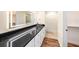 Bathroom with a glass bowl sink, granite countertop, and illuminated mirror at 13518 Palmwood Ln # 13518, Tampa, FL 33618