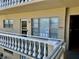 Exterior balcony with door and windows allowing for plenty of natural light at 2331 Finlandia Ln # 43, Clearwater, FL 33763