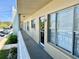 Balcony hallway with unit number and large windows bringing in plenty of natural light at 2331 Finlandia Ln # 43, Clearwater, FL 33763