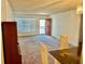 Bright living room with cozy carpet and a window that let in a lot of natural light at 2331 Finlandia Ln # 43, Clearwater, FL 33763