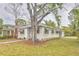 Charming single-story home with mature landscaping, awnings, and a well-maintained front yard at 2412 53Rd S St, Gulfport, FL 33707
