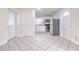 Kitchen showcasing white cabinets, stainless steel appliances, and beautiful tile flooring at 2412 53Rd S St, Gulfport, FL 33707