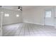 Bright living room with tile flooring, neutral paint, and a ceiling fan at 2412 53Rd S St, Gulfport, FL 33707