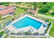 Enjoy a large rectangular community swimming pool with plenty of seating, perfect for summer relaxation at 2507 Royal Pines Cir # 2H, Clearwater, FL 33763