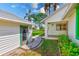 Charming villa with a private entrance and lush green landscaping, creating a serene environment at 2507 Royal Pines Cir # 2H, Clearwater, FL 33763