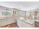 Bright and open kitchen with granite countertops and stainless steel appliances at 2507 Royal Pines Cir # 2H, Clearwater, FL 33763