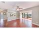 Inviting living room with wood-look floors and an open concept design to other rooms in the house at 2507 Royal Pines Cir # 2H, Clearwater, FL 33763