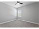 Bedroom featuring neutral walls, carpet flooring, and a window at 2612 Leafwing Ct, Palm Harbor, FL 34683