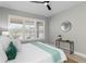 Bedroom featuring natural light and a modern minimalist design at 2612 Leafwing Ct, Palm Harbor, FL 34683