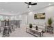 Cozy living area with carpeting and comfortable seating at 2612 Leafwing Ct, Palm Harbor, FL 34683