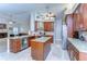 Well-appointed kitchen featuring custom cabinets, granite countertops, and modern stainless steel appliances at 2749 Bent Leaf Dr, Valrico, FL 33594